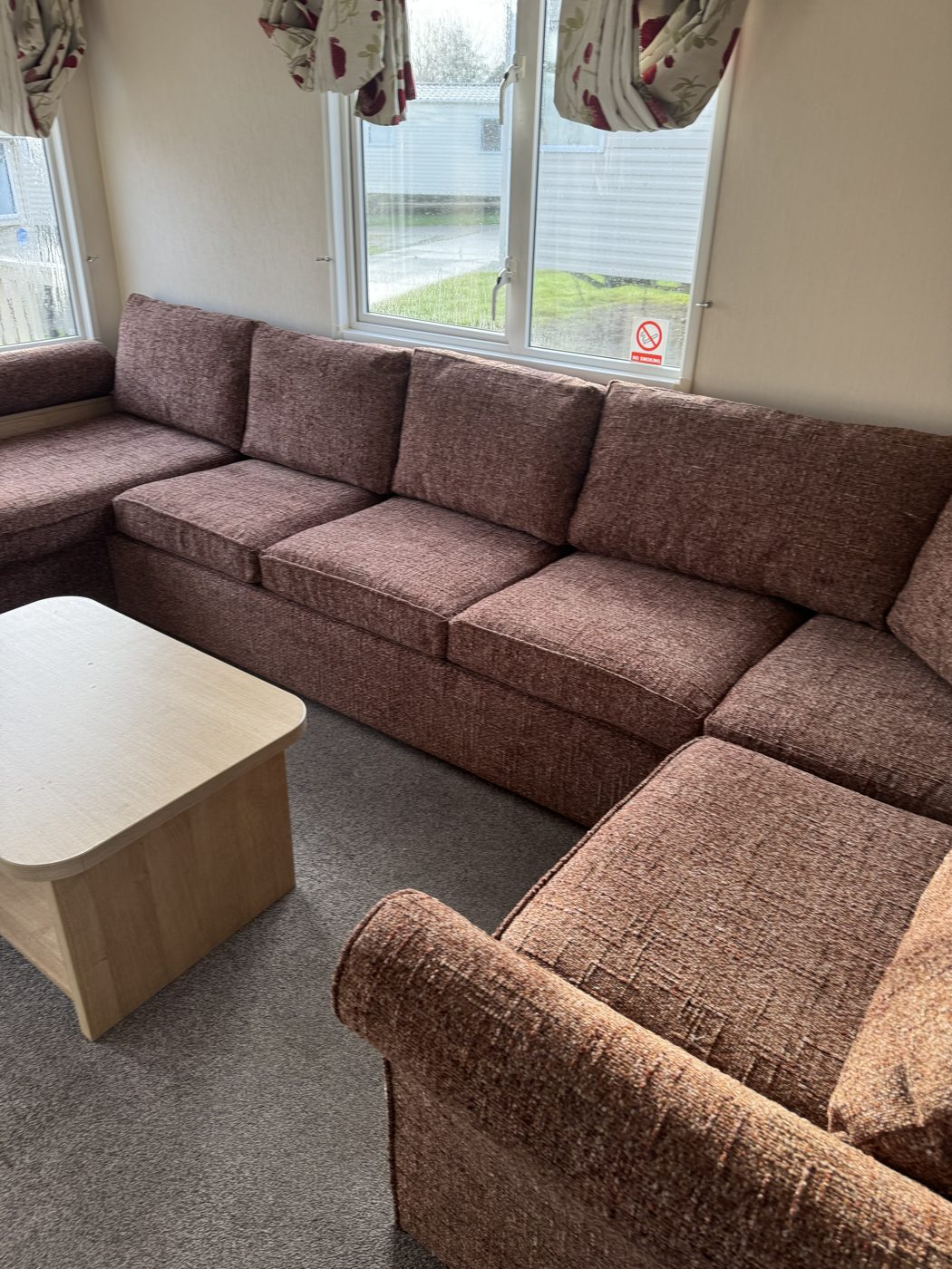 Caravan seating suite re-upholstered in hard-wearing brown weave