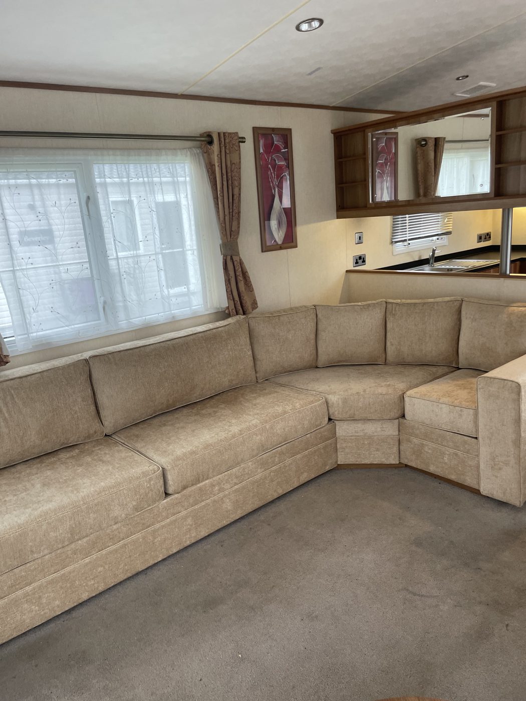Static caravan lounge corner seating with new cushions and covers