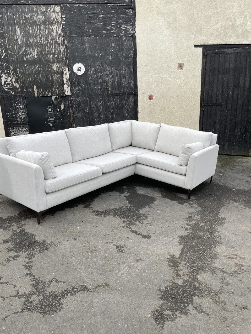 Corner sofa fully re-upholstered in white fabric, Blackpool